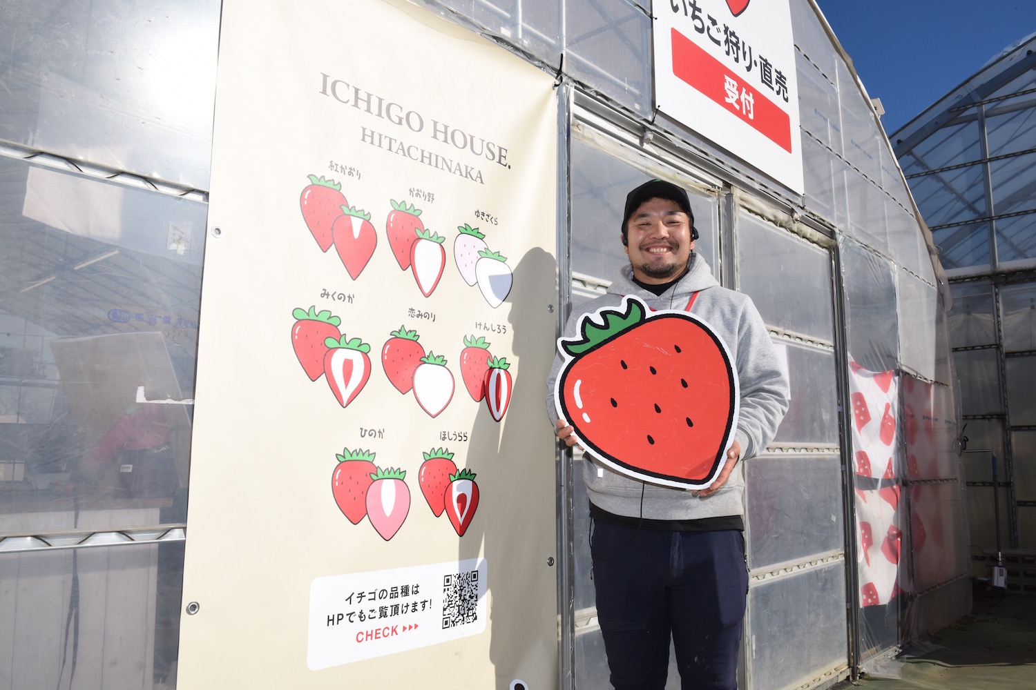 品種説明板と佐々木さん